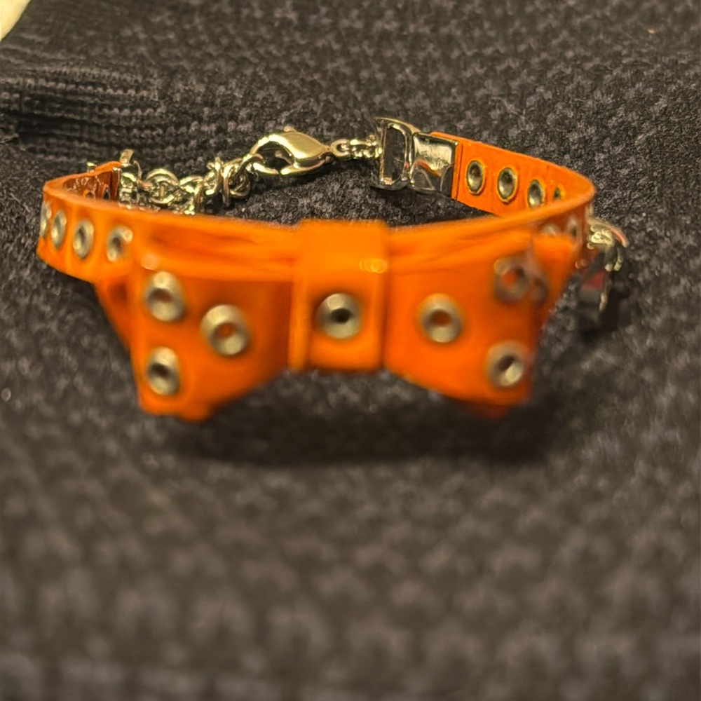 CHRISTIAN DIOR orange Patent Leather Bow Bracelet